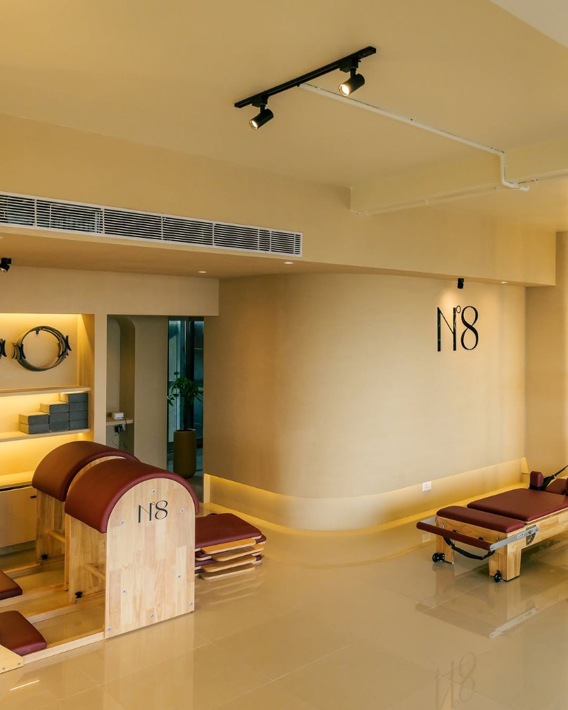 Studio N°8 interior — reformers and N°8 branding in Bhaisepati